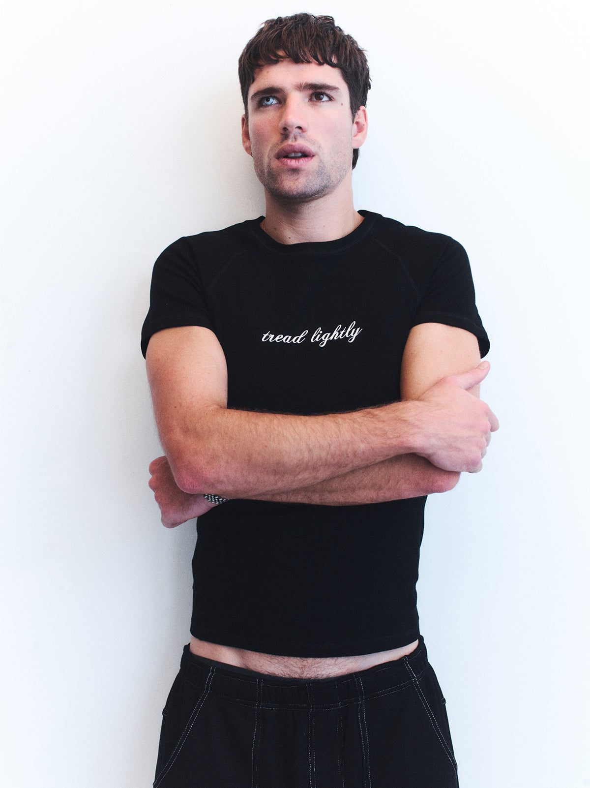 3. TREAD LIGHTLY BLACK TEE