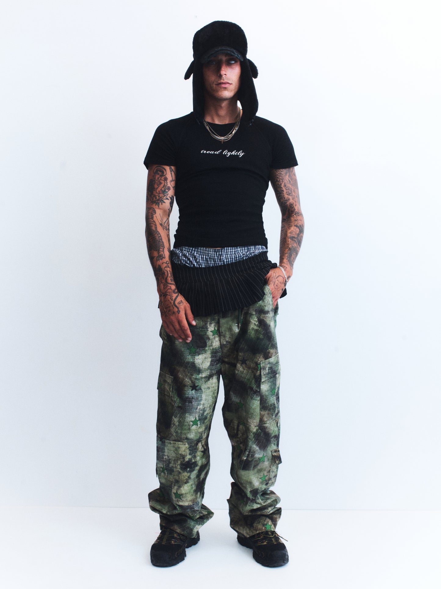 3. TREAD LIGHTLY BLACK TEE