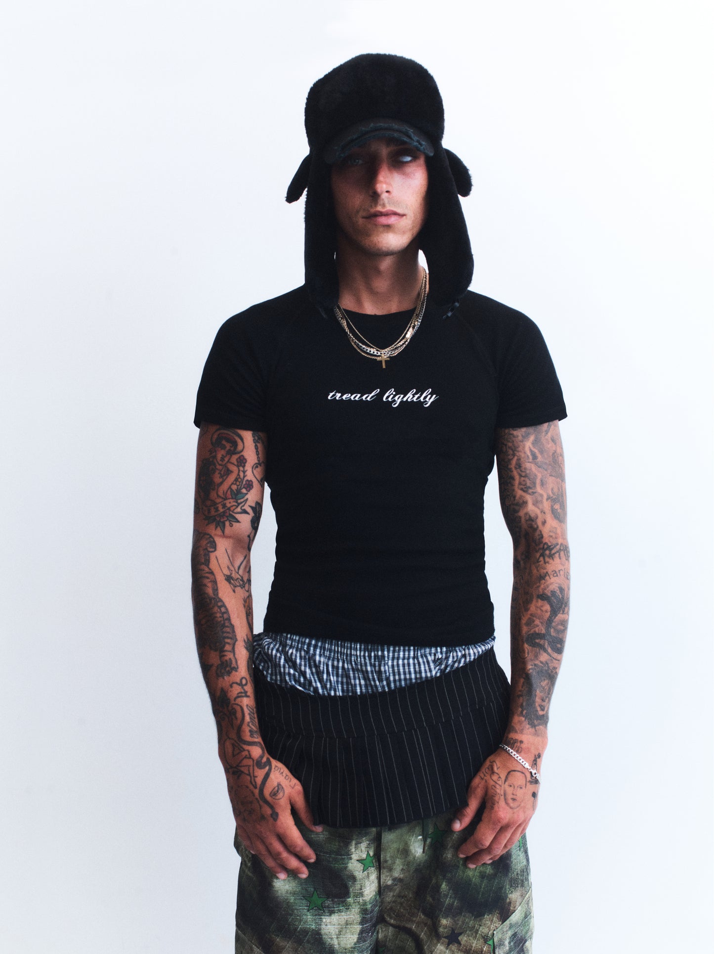 3. TREAD LIGHTLY BLACK TEE