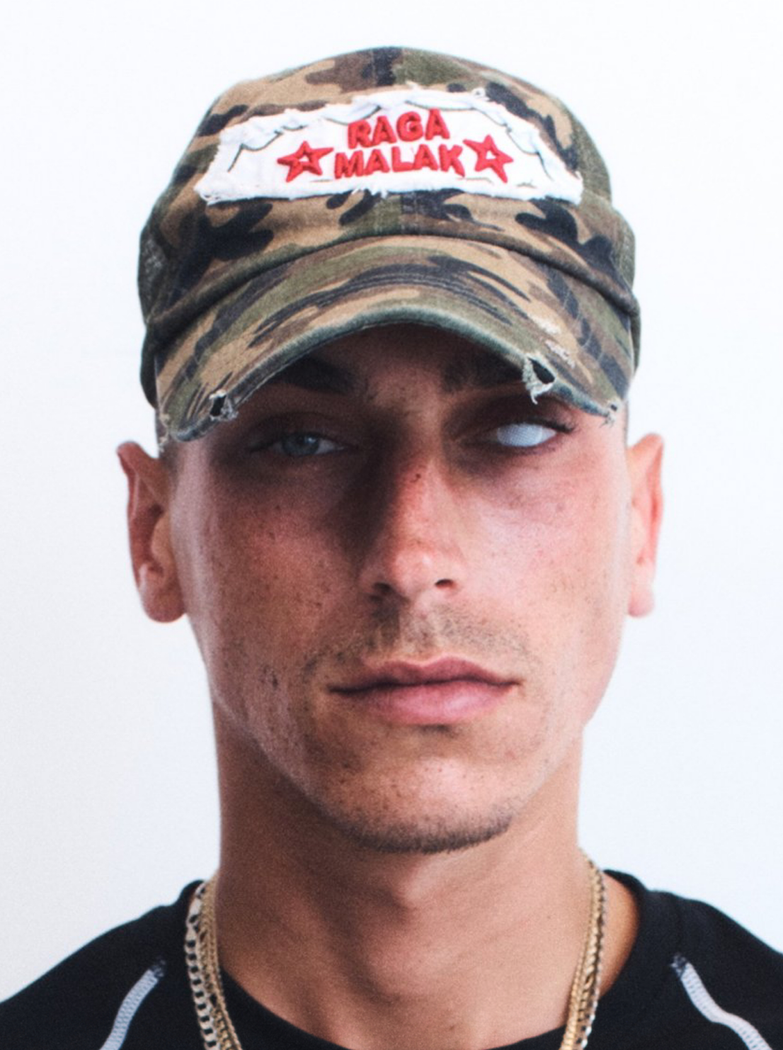 K. CAMO TRUCKER HAT
