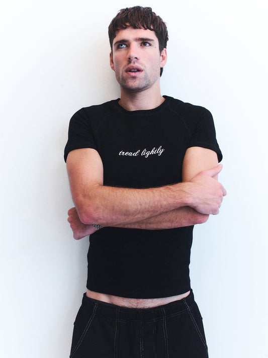 3. TREAD LIGHTLY BLACK TEE