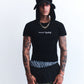 3. TREAD LIGHTLY BLACK TEE